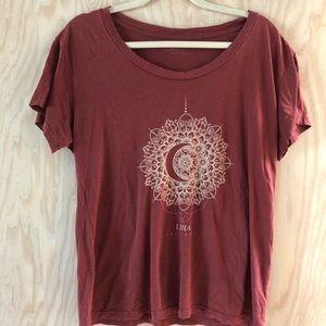 Lira maroon shirt with design on front